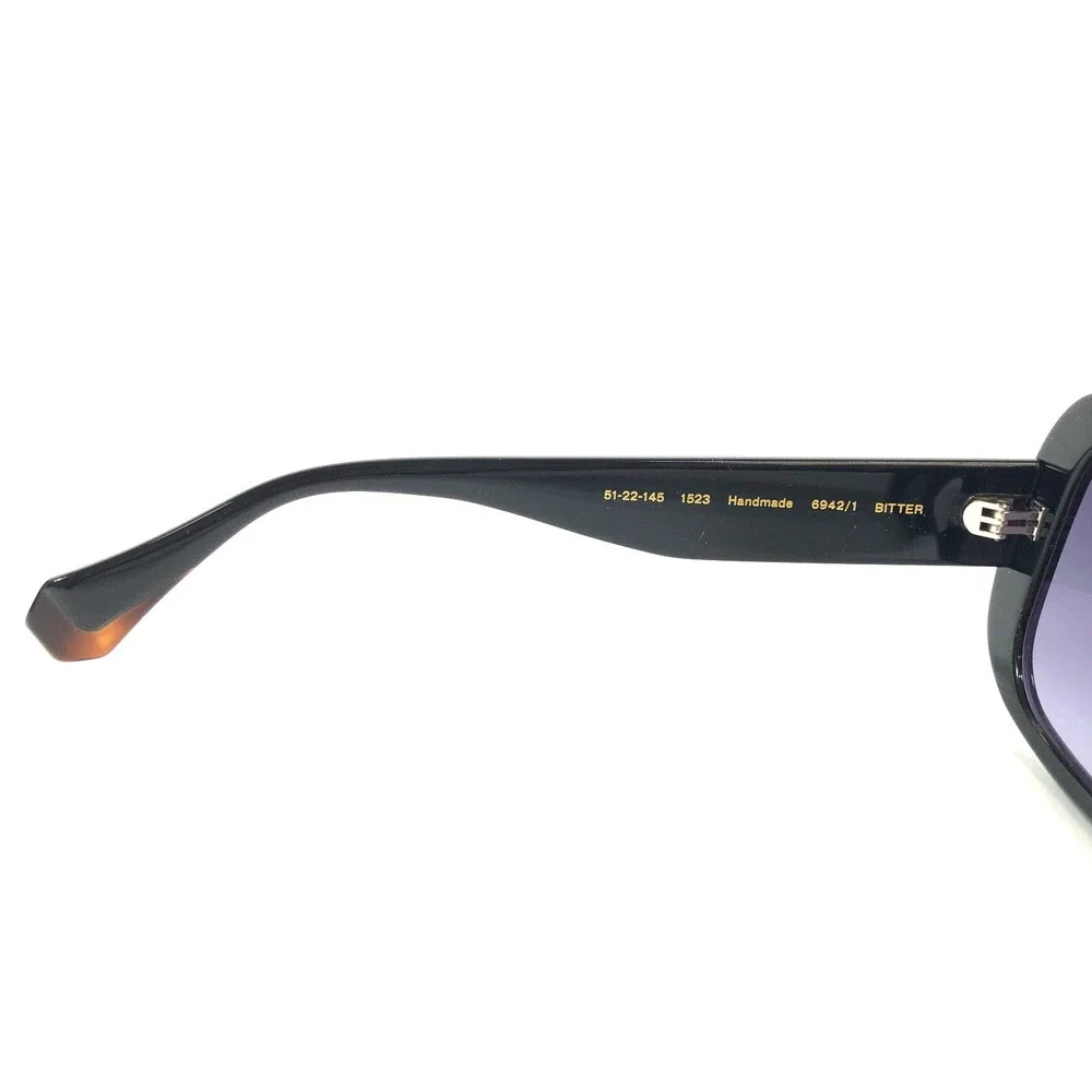 Gigi Studios Sunglasses BITTER 6942/1 Shiny Black Frames Gray Gradient Lenses